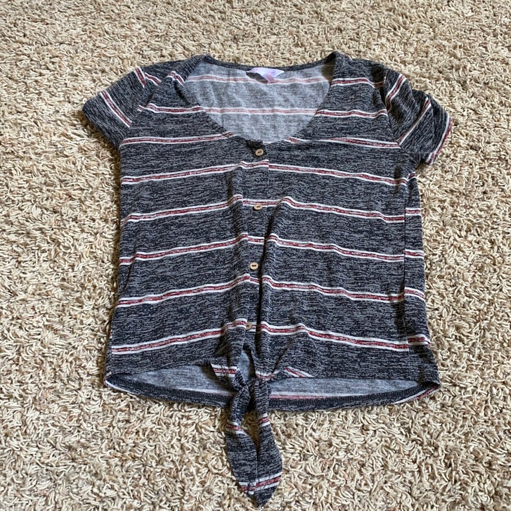 red,white,and dark grey button up short-sleeve shirt